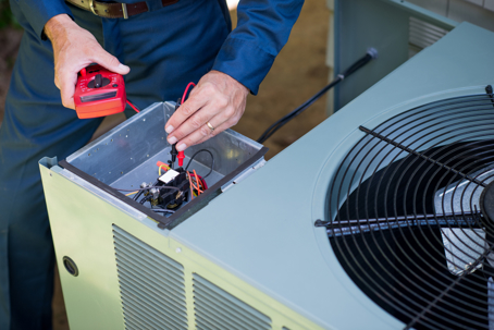 tech doing an AC tune up
