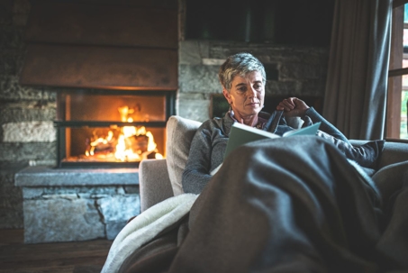 Woman enjoying a warm home